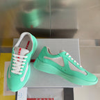 Prada unisex mint green sneakers with gray mesh, white laces, and low profile sole