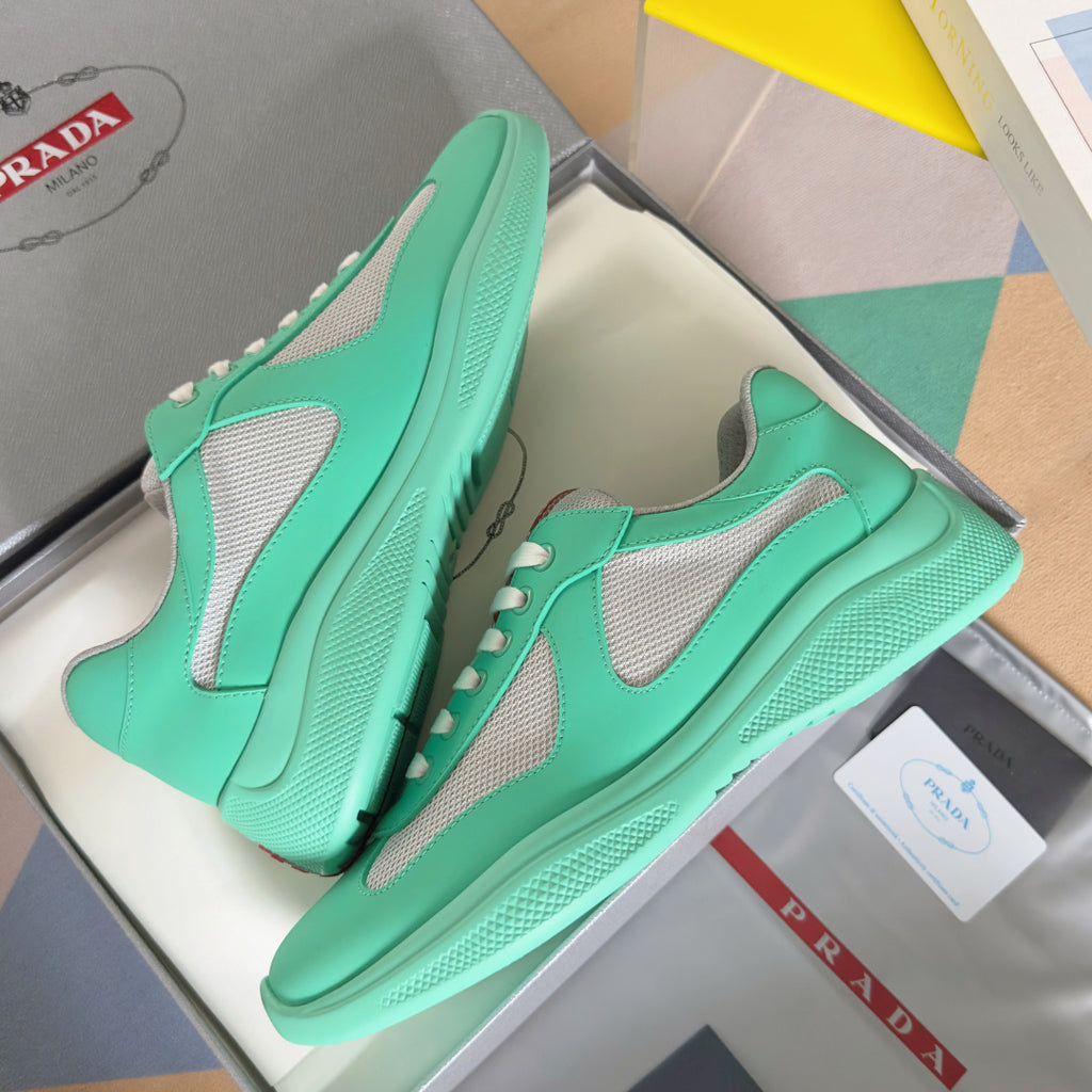 Prada unisex mint green sneakers with gray side mesh and textured rubber outsole