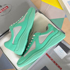 Prada unisex mint green sneakers with gray side mesh and textured rubber outsole