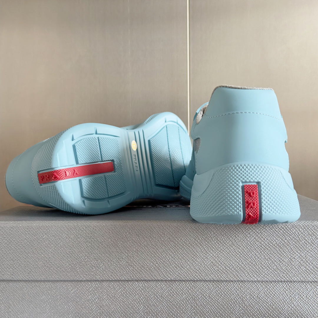 Prada unisex sneakers heel and outsole, light blue uppers with beige panels and treaded sole