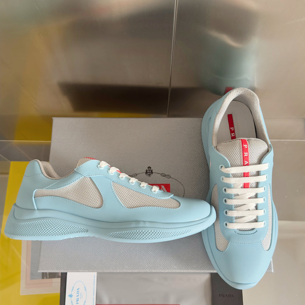 Prada unisex low-top sneakers, light blue leather with beige inserts and lace-up front