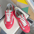 Prada unisex sneakers in bright pink with gray/white panels and white lace-up