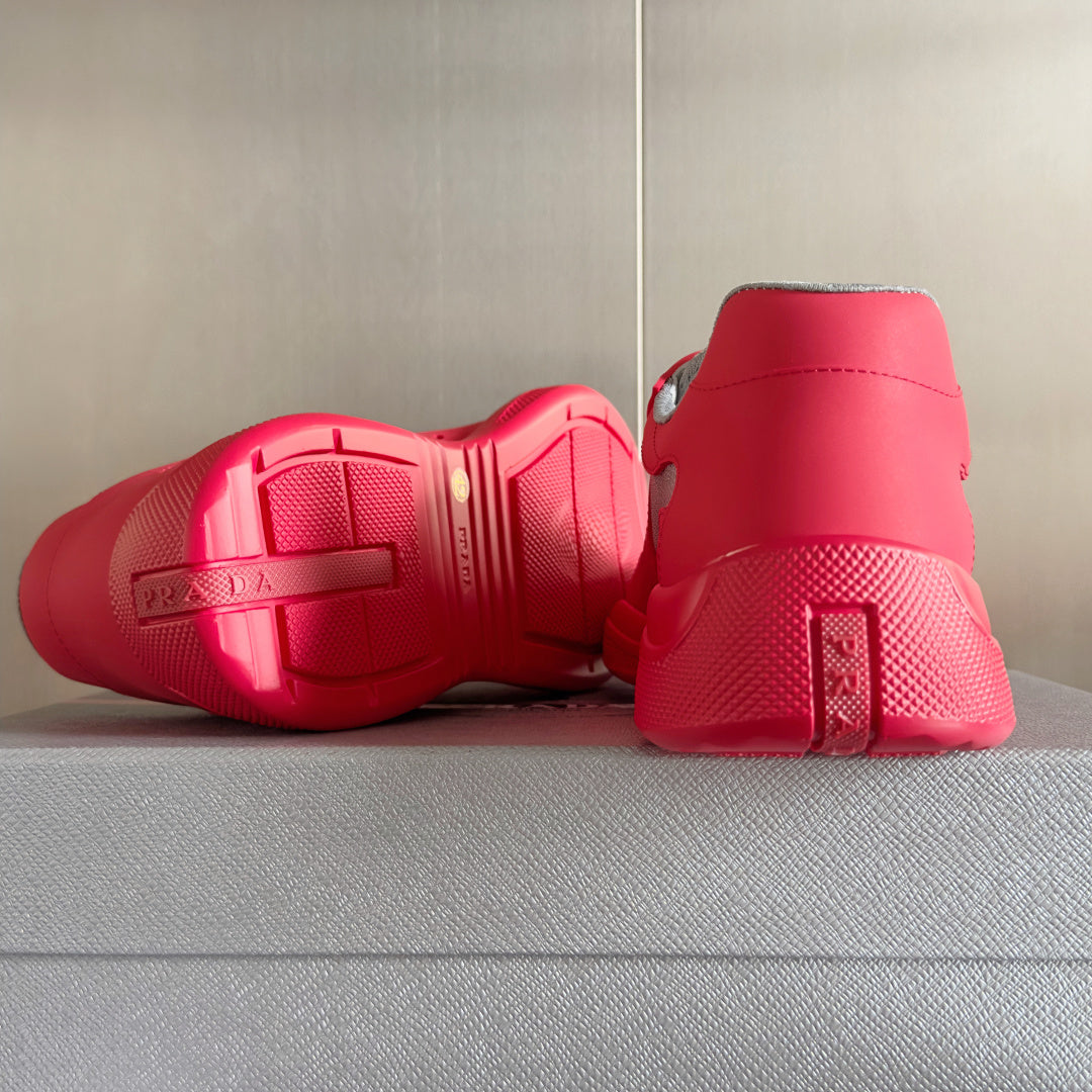 Prada unisex sneakers bright pink with textured tread outsole and rear heel