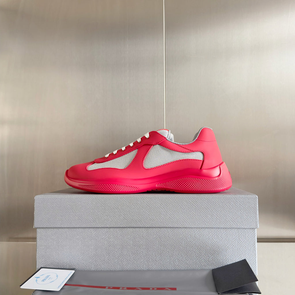 Prada unisex sneakers bright pink with gray mesh side panel and white lace-up