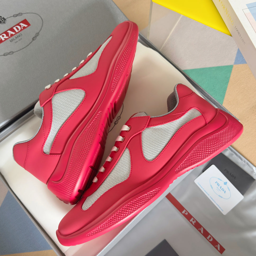Prada unisex sneakers bright pink with gray mesh panels and textured rubber sole
