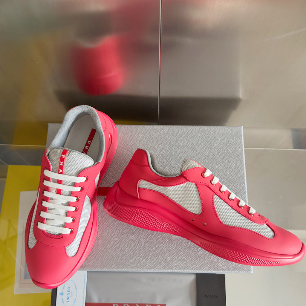 Prada unisex sneakers, bright pink with gray mesh quarter panel and white laces