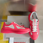 Prada unisex sneakers, bright pink with gray mesh inserts and white lace-up