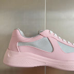 Pink Prada unisex sneaker with gray mesh side panel and textured rubber sole