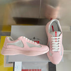 Pink Prada unisex sneakers with gray mesh inserts and white lace-up front