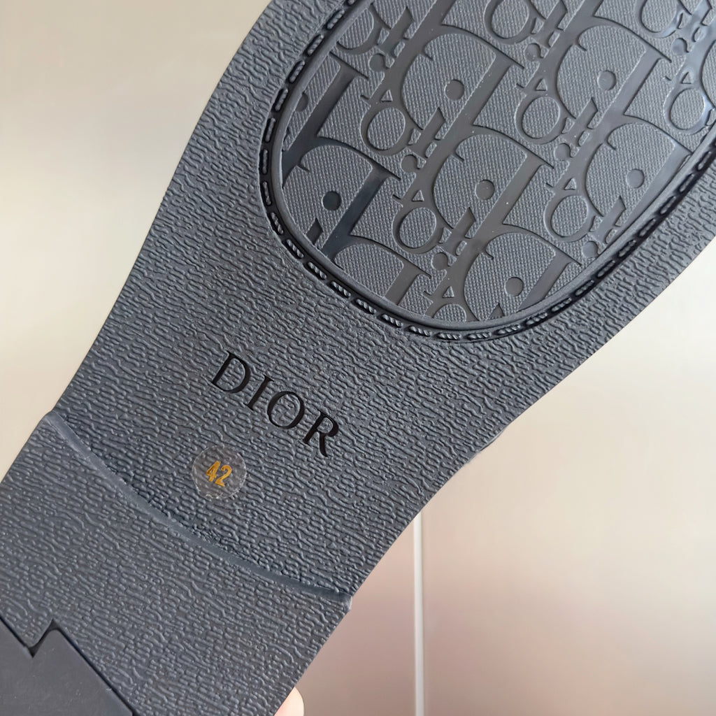 Dior sandal footbed with DIOR text and textured gray monogram pattern