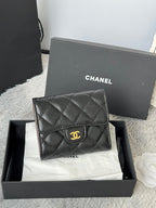 CHANEL small black quilted flap wallet, front view