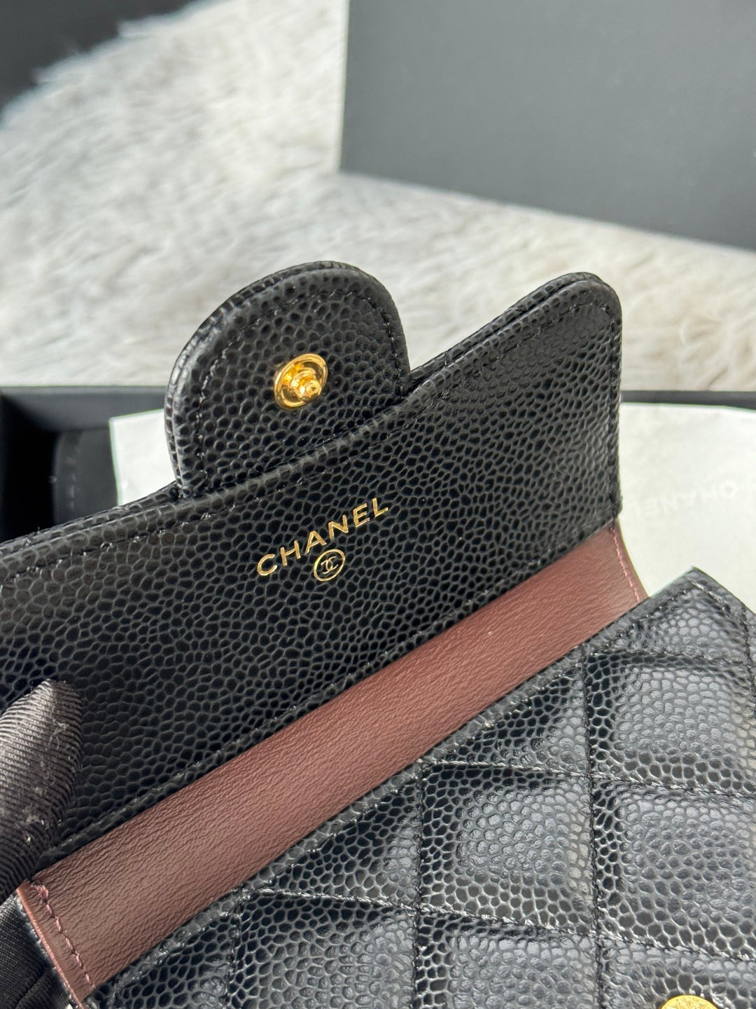 CHANEL small black textured wallet corner with gold logo studs