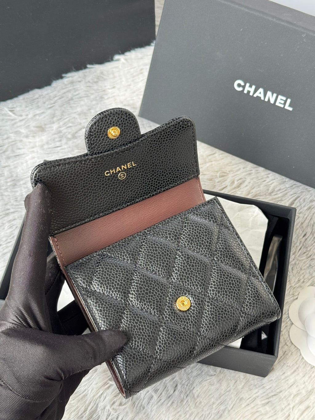 CHANEL small black wallet with brown back panel and gold logo stud