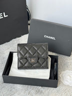 Black Chanel quilted leather flap bag with CC clasp, front view