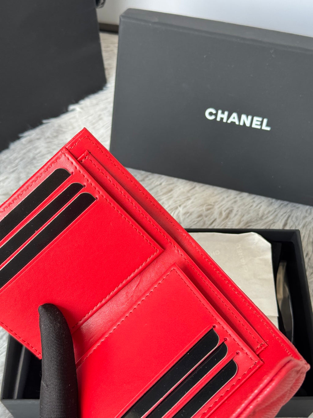 Red small bag with front card slots and black-trim handle