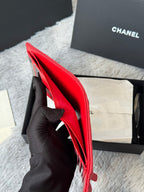 Red small bag open, showing interior and black card slot panel