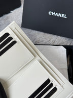 Off-white small bag wallet with card-slot front and stitched flap