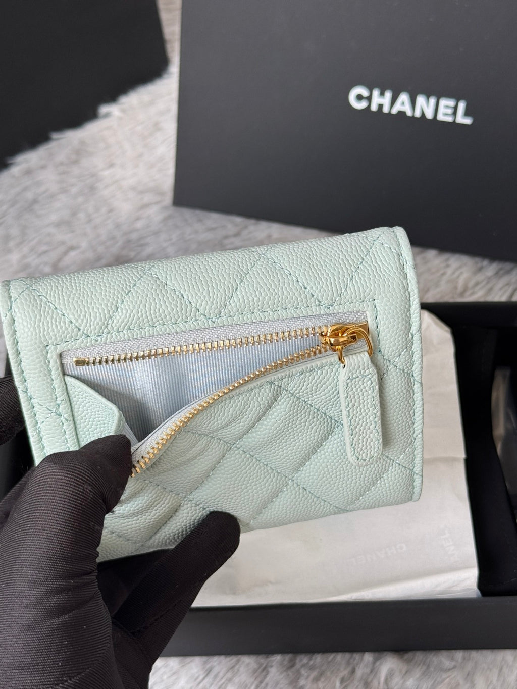 Mint quilted leather small bag with gold-tone zipper and CC logo front