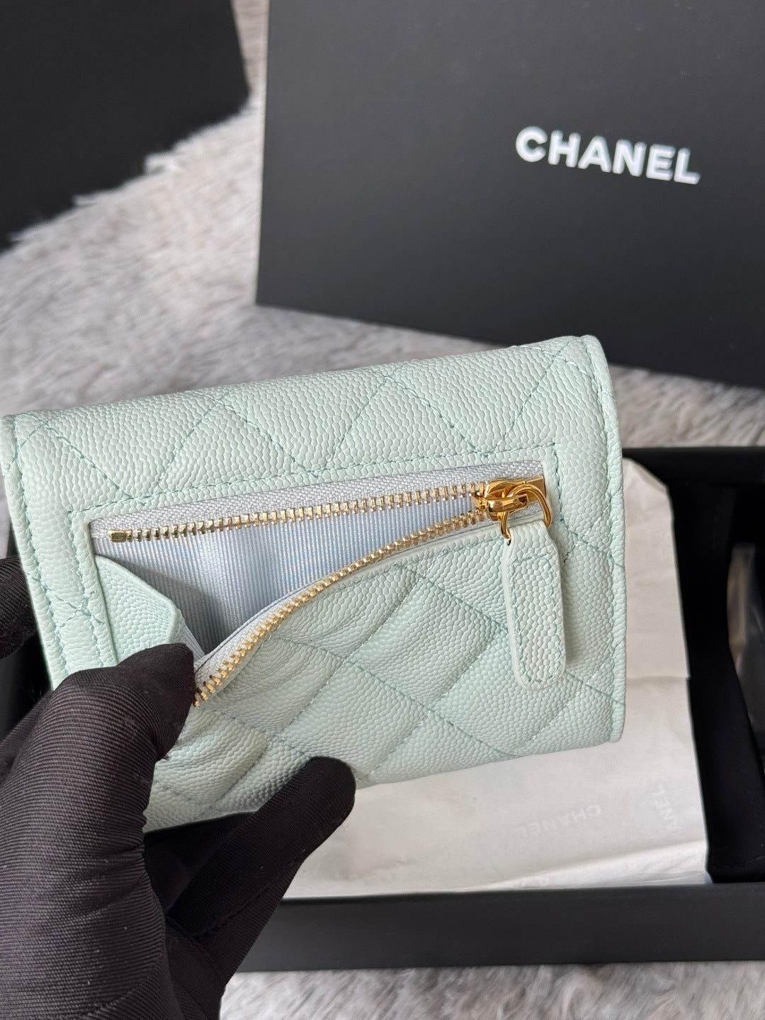 Mint quilted leather small bag with gold-tone zipper and CC logo front