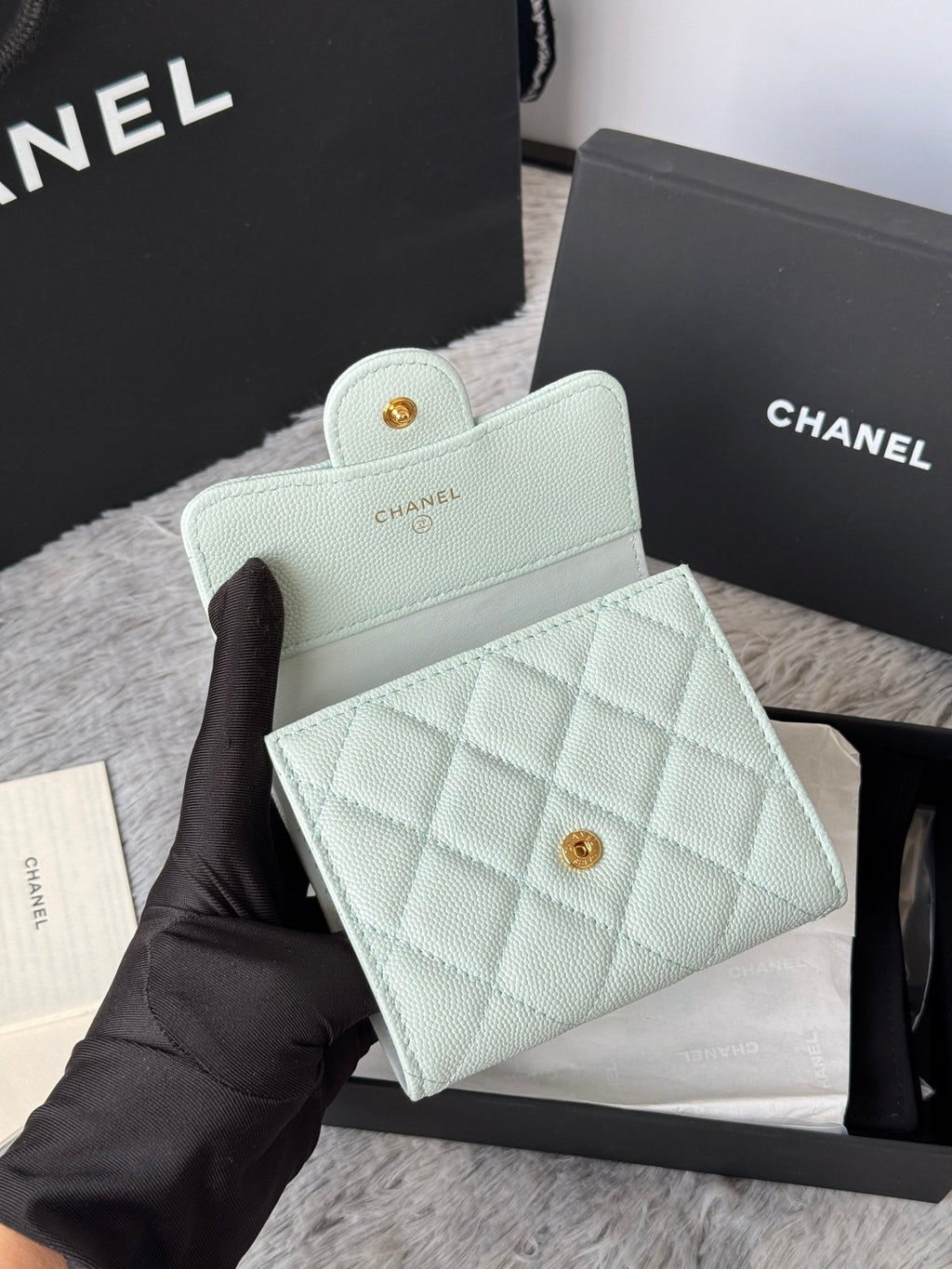 Mint quilted leather small bag with flap and gold-tone CC snap detail