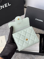 Mint quilted leather small bag with flap and gold-tone CC snap detail