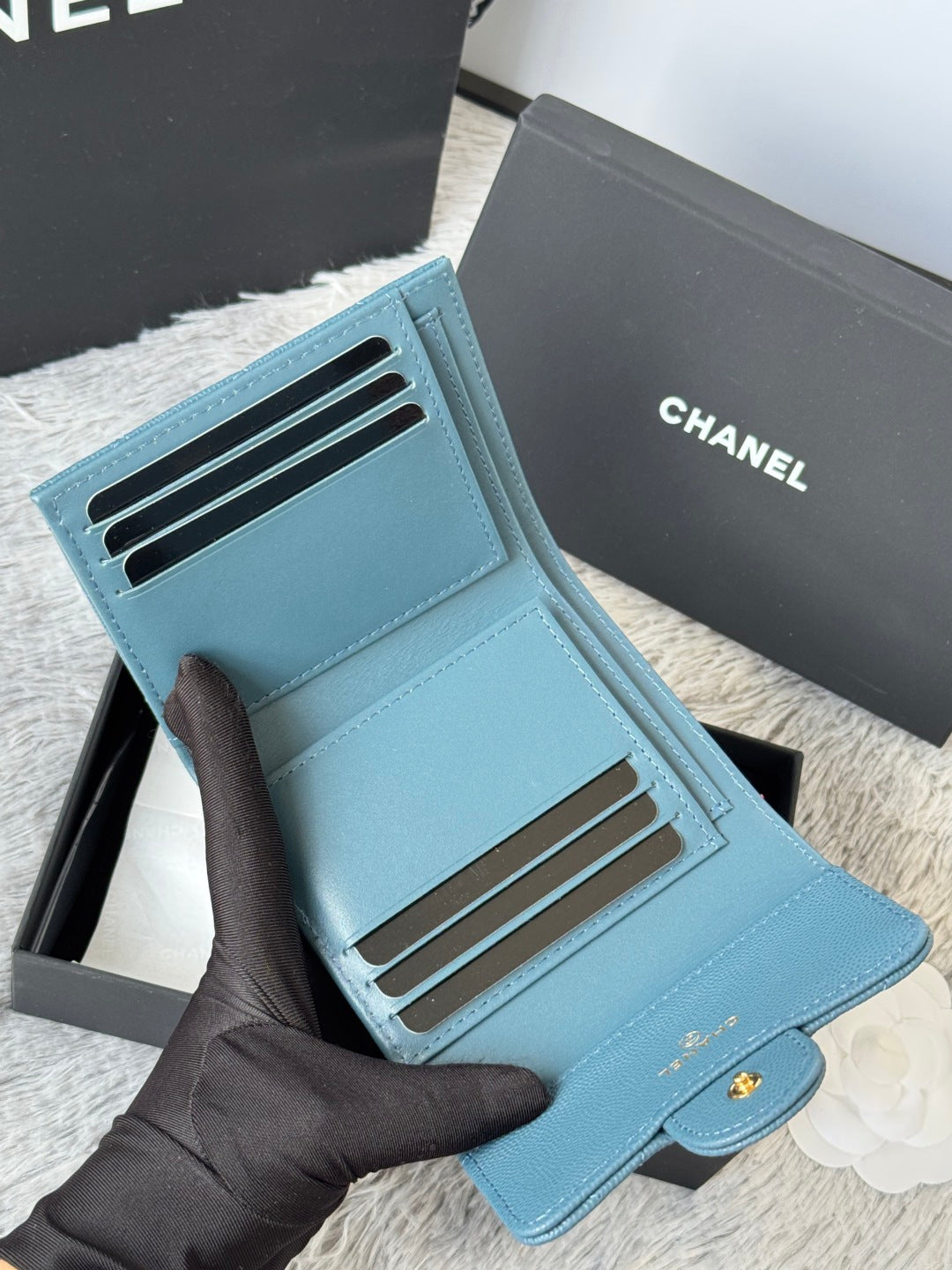 Small bag wallet in light blue leather with card slots and CHANEL logo detail