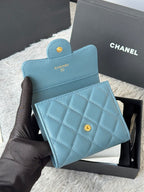 Small bag set: light blue flap wallet with quilted front and CHANEL logo