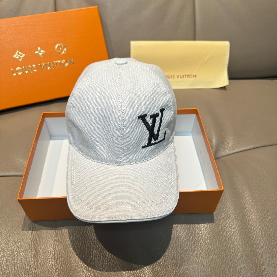 White Louis Vuitton baseball cap, side view with black LV logo