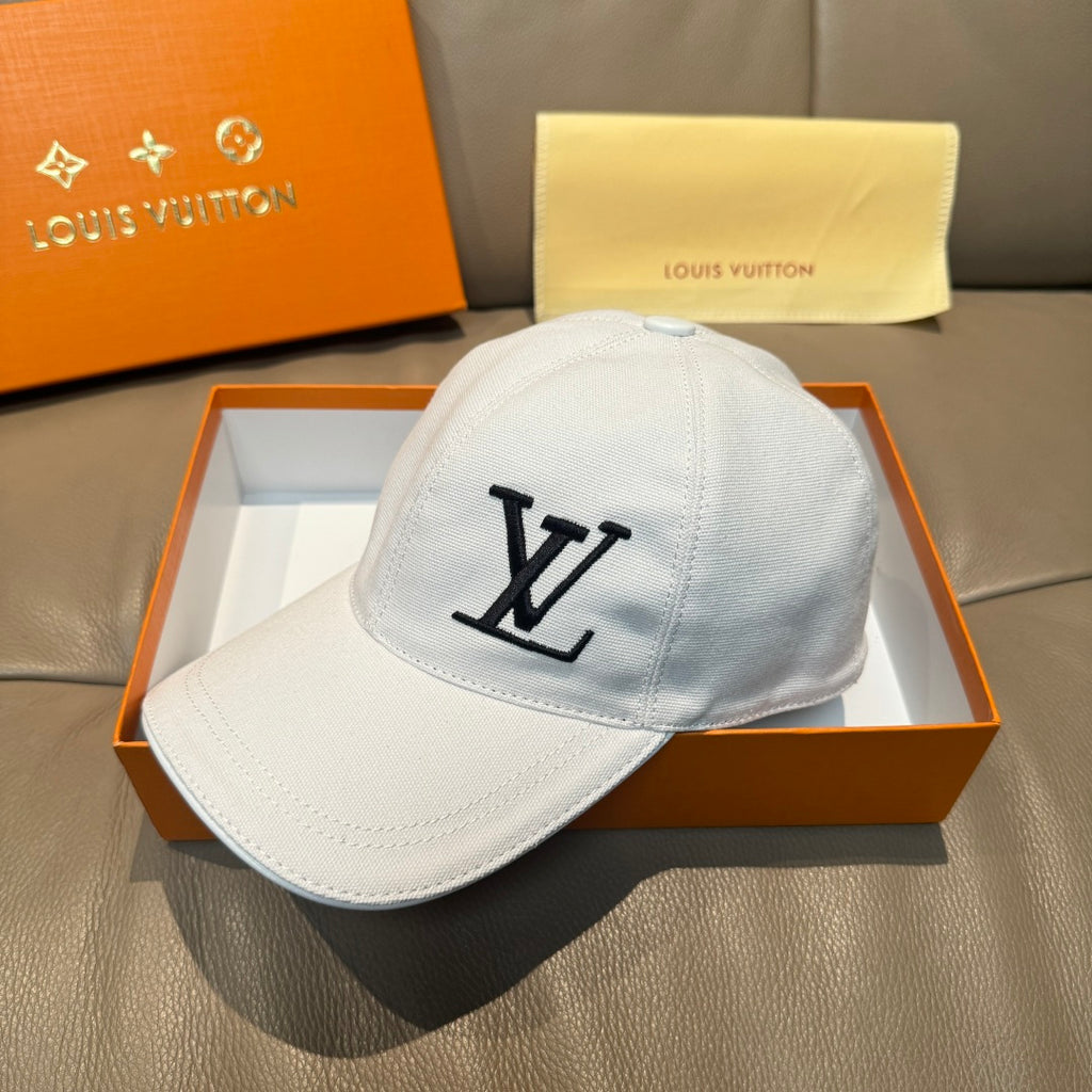 White Louis Vuitton cap with black LV logo and curved brim