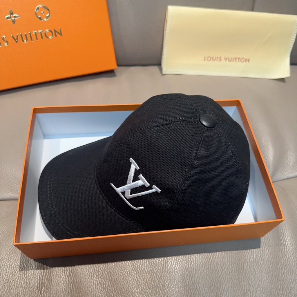 Black Louis Vuitton baseball cap with LV monogram on front panel, curved brim.