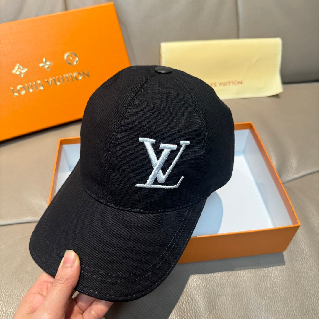 Black Louis Vuitton baseball cap with LV monogram and top button, curved brim.