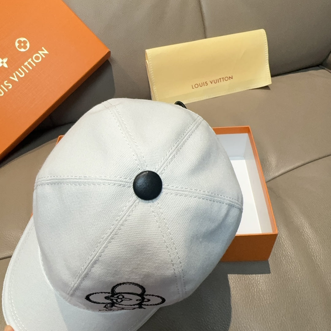 Louis Vuitton white cap back view with black button and stitching details