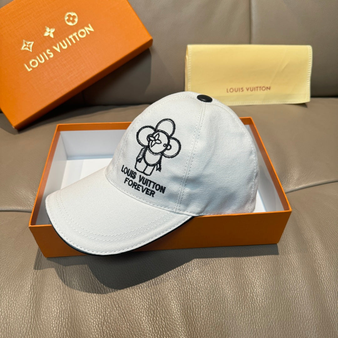 Louis Vuitton white baseball cap with black flower emblem and 'LOUIS VUITTON FOREVER'