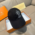 Louis Vuitton cap, black with embroidered Mickey-style flower logo and 'Forever' text