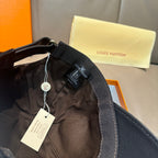 Louis Vuitton cap, black with adjustable strap and hanging tag