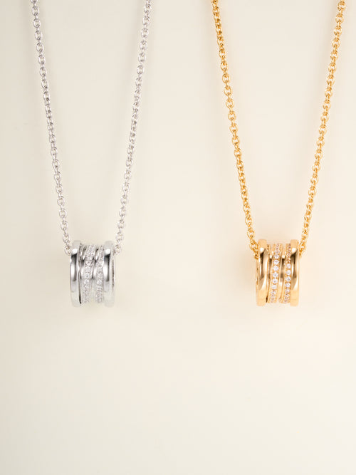 Gold and silver hoop charm necklaces with crystal-like pavé on chain