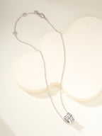 Silver chain necklace with round hoop pendant and crystal pavé center