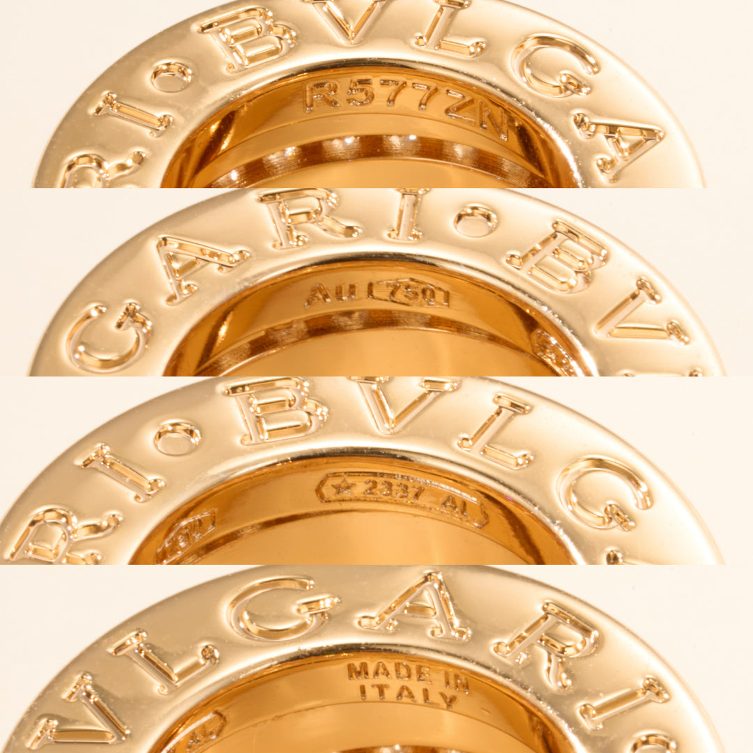 Gold stacked ring bands with engraved lettering and inset crystal pavé