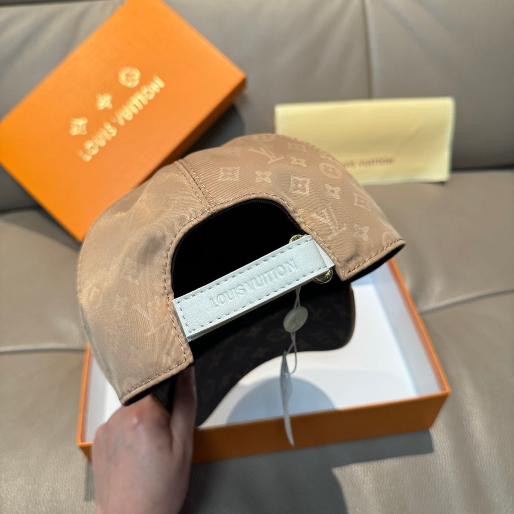 Louis Vuitton cap interior view with beige strap and label on the underside.