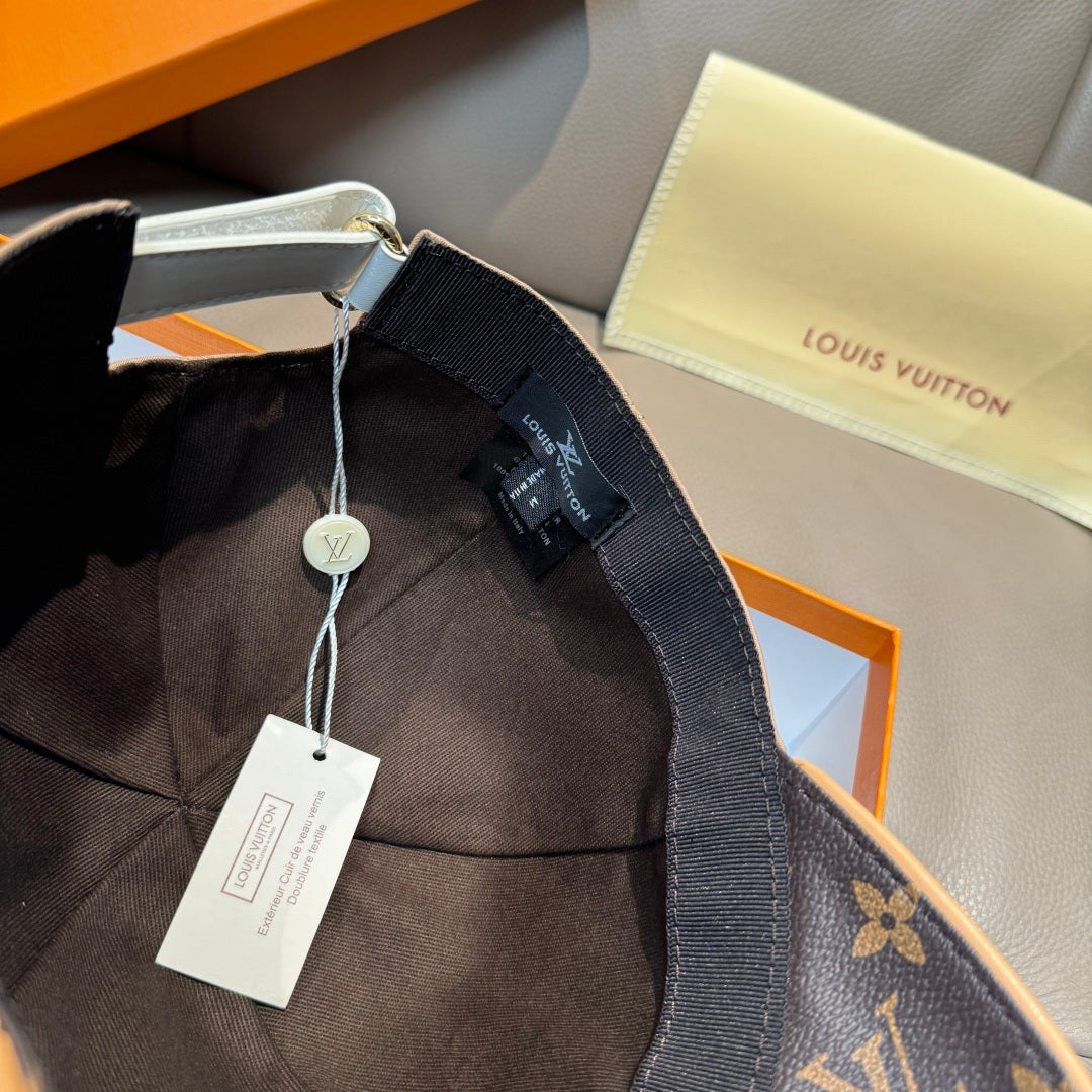 Louis Vuitton cap interior with dark fabric strap and attached size tag.