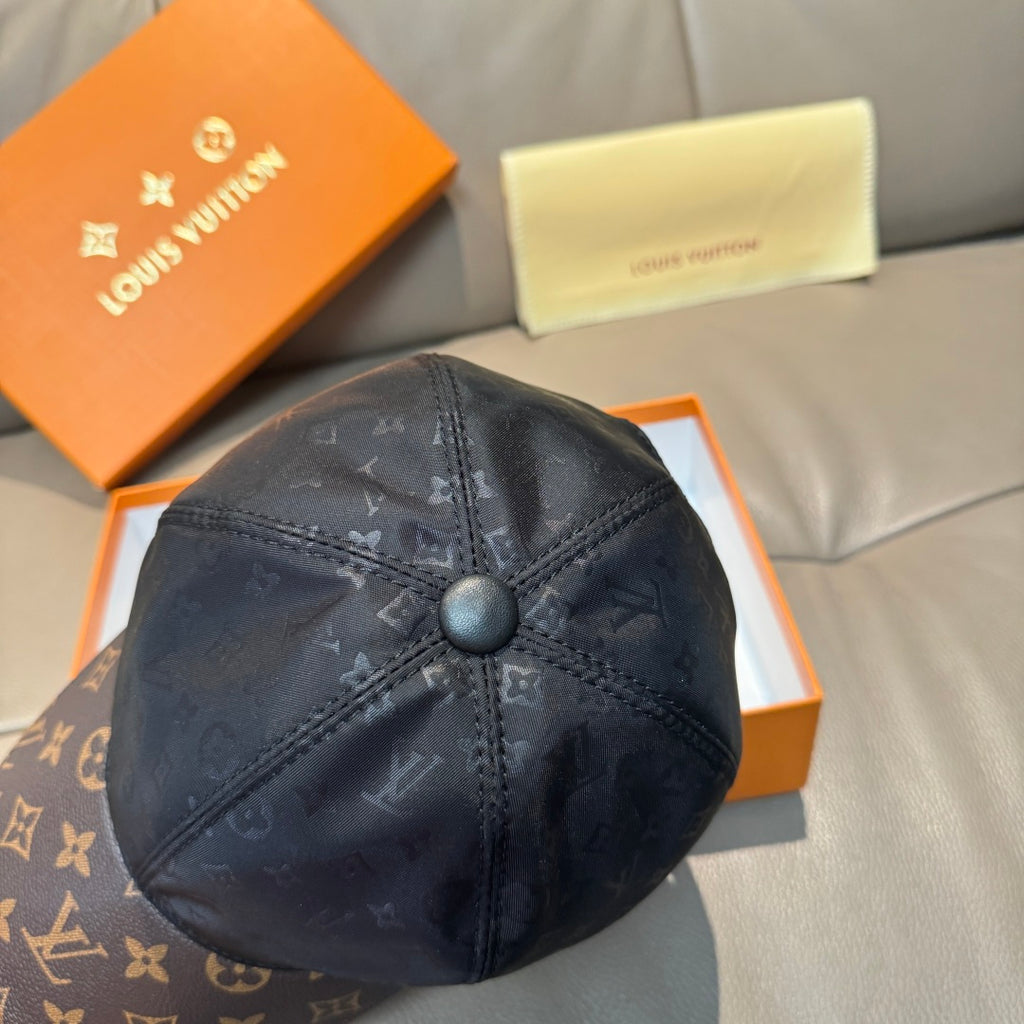 Louis Vuitton baseball cap in dark monogram fabric with round button on crown.