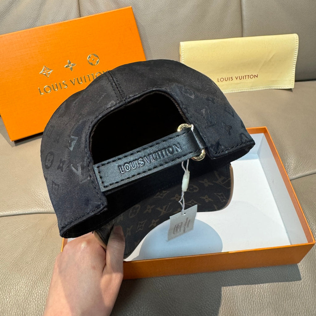 Louis Vuitton baseball cap underside with adjustable strap and logo patch, dark crown.