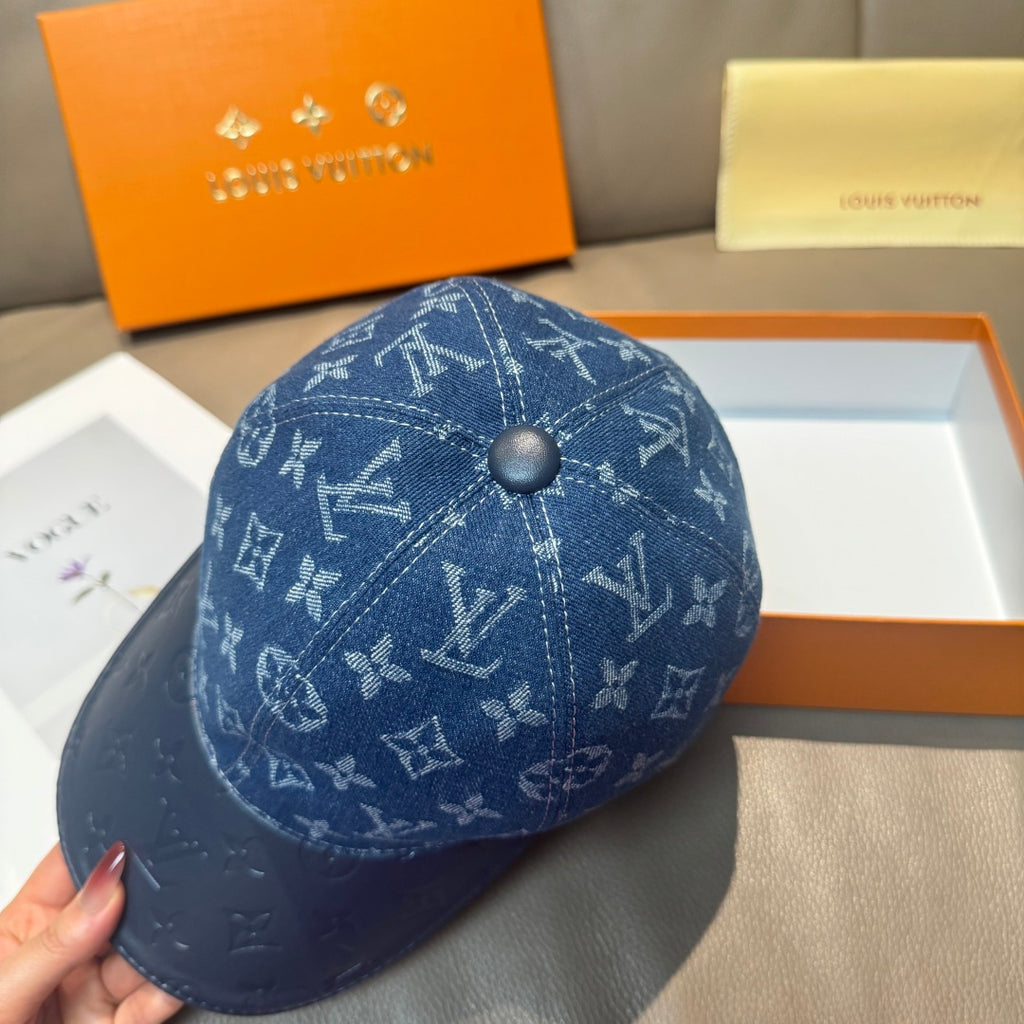 Blue monogram denim baseball cap front view with round top button