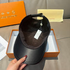 Black Louis Vuitton cap interior with adjustable strap and hanging tag