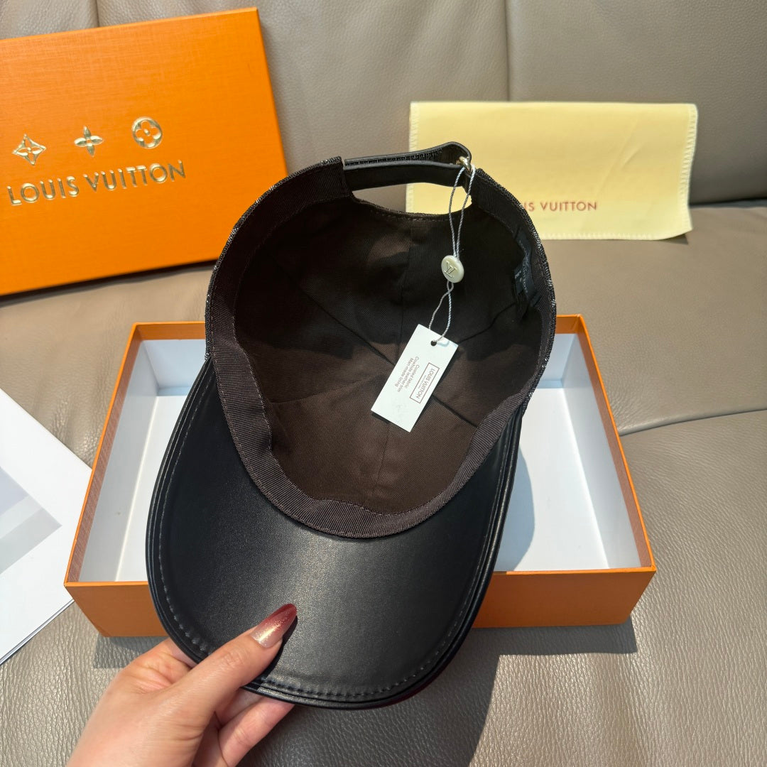 Black Louis Vuitton cap interior with adjustable strap and hanging tag