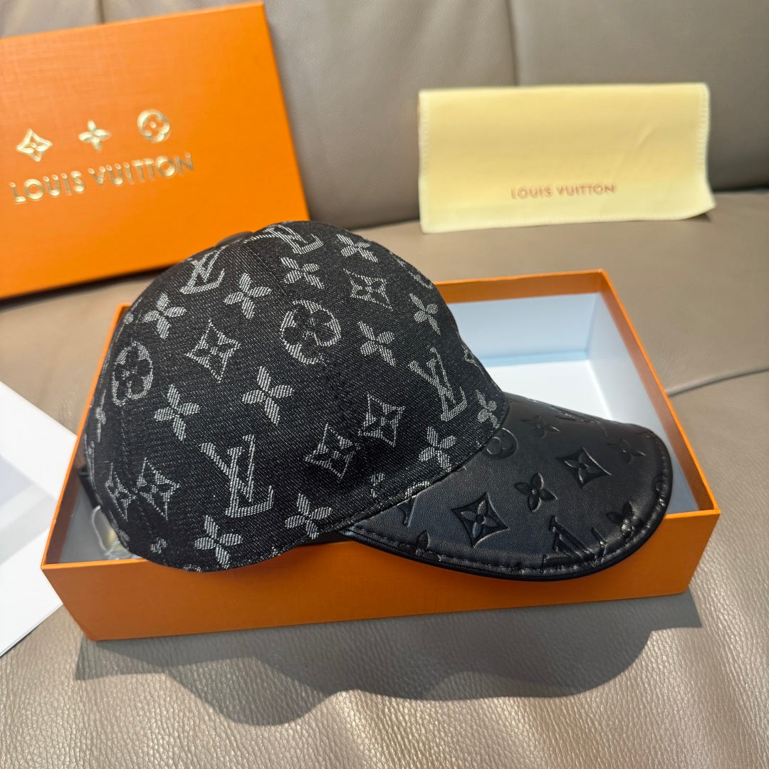 Louis Vuitton monogram baseball cap with curved brim and dark leather-look detailing