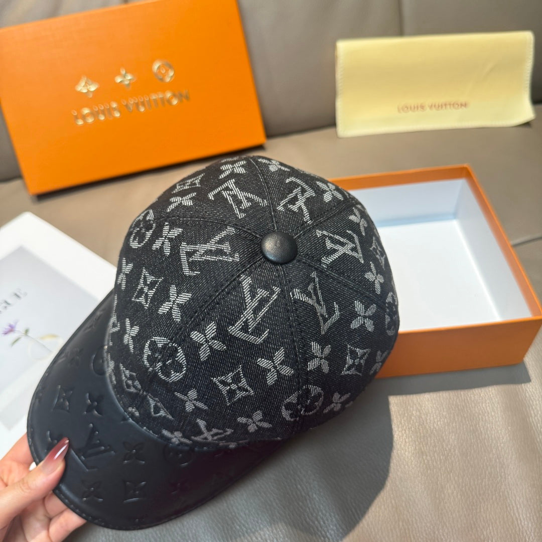 Louis Vuitton monogram baseball cap with button closure and curved brim