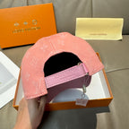 Louis Vuitton pink monogram cap with black underside opening and stitched edge