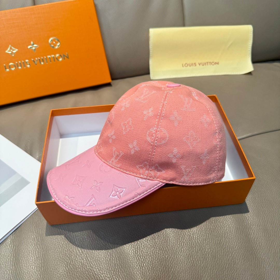 Louis Vuitton pink monogram baseball cap with curved brim, side view