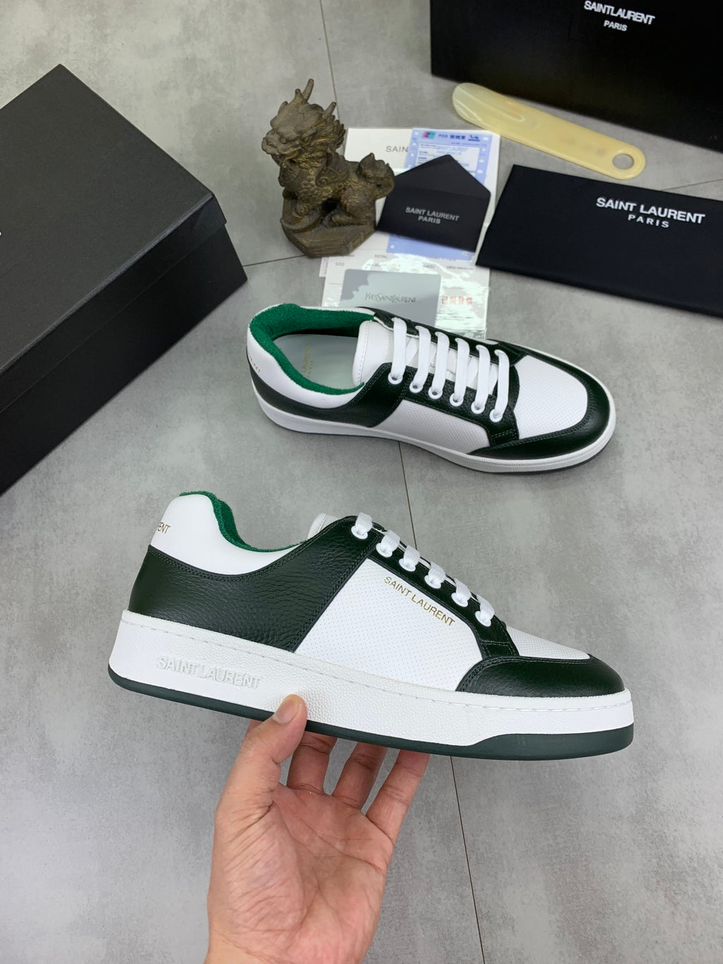 Luxury shoes white-and-dark-green sneaker with white laces and green collar lining